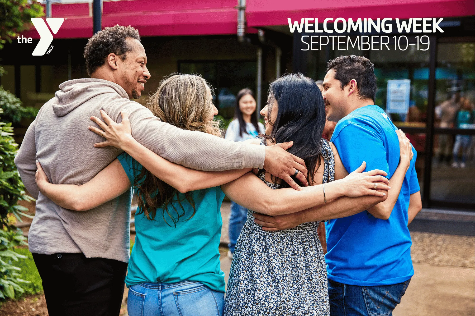 Group of people with arms wrapped around each others' backs