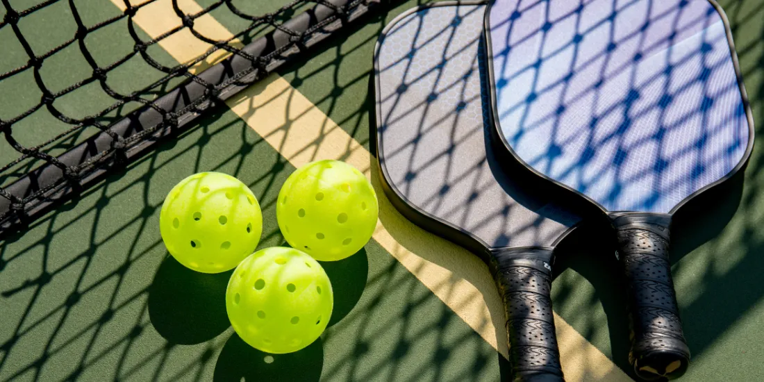 Pickleball paddles and balls