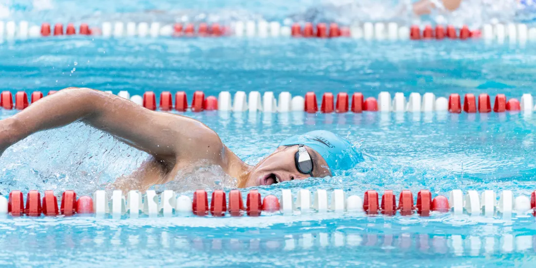 woman swimming competitively