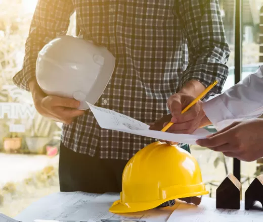 people looking at plans